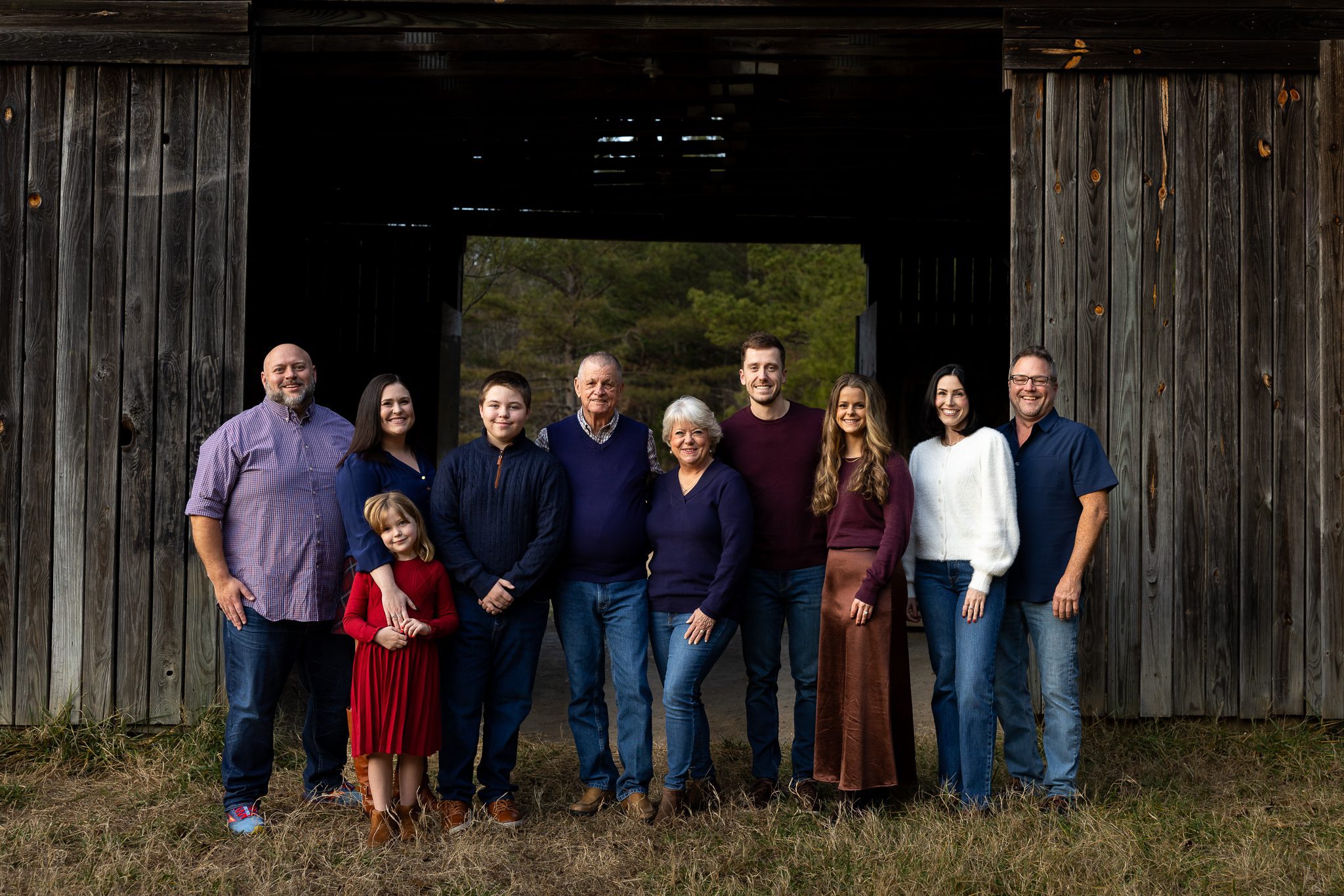 large extended family portrait in front of barn during Milton Georgia photography session